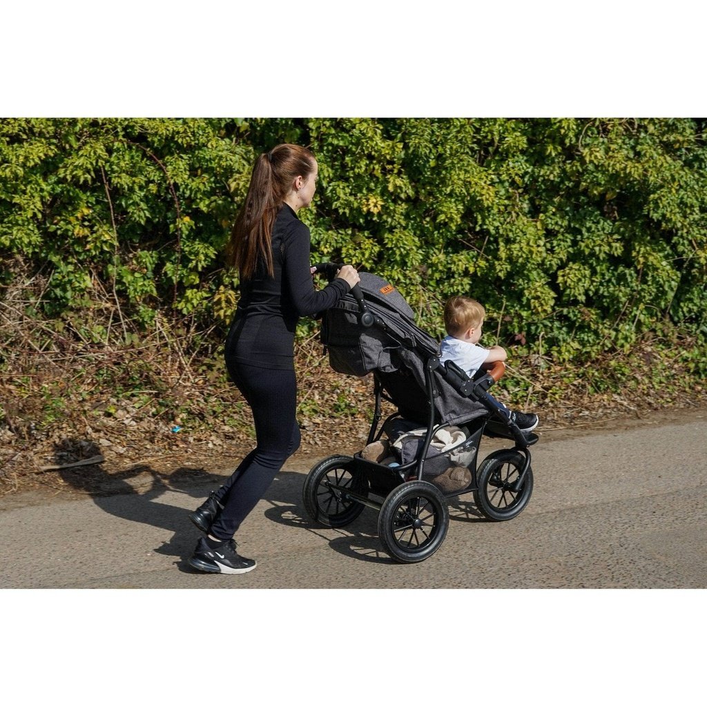 Photo of woman jogging with Amababy Swift stroller 