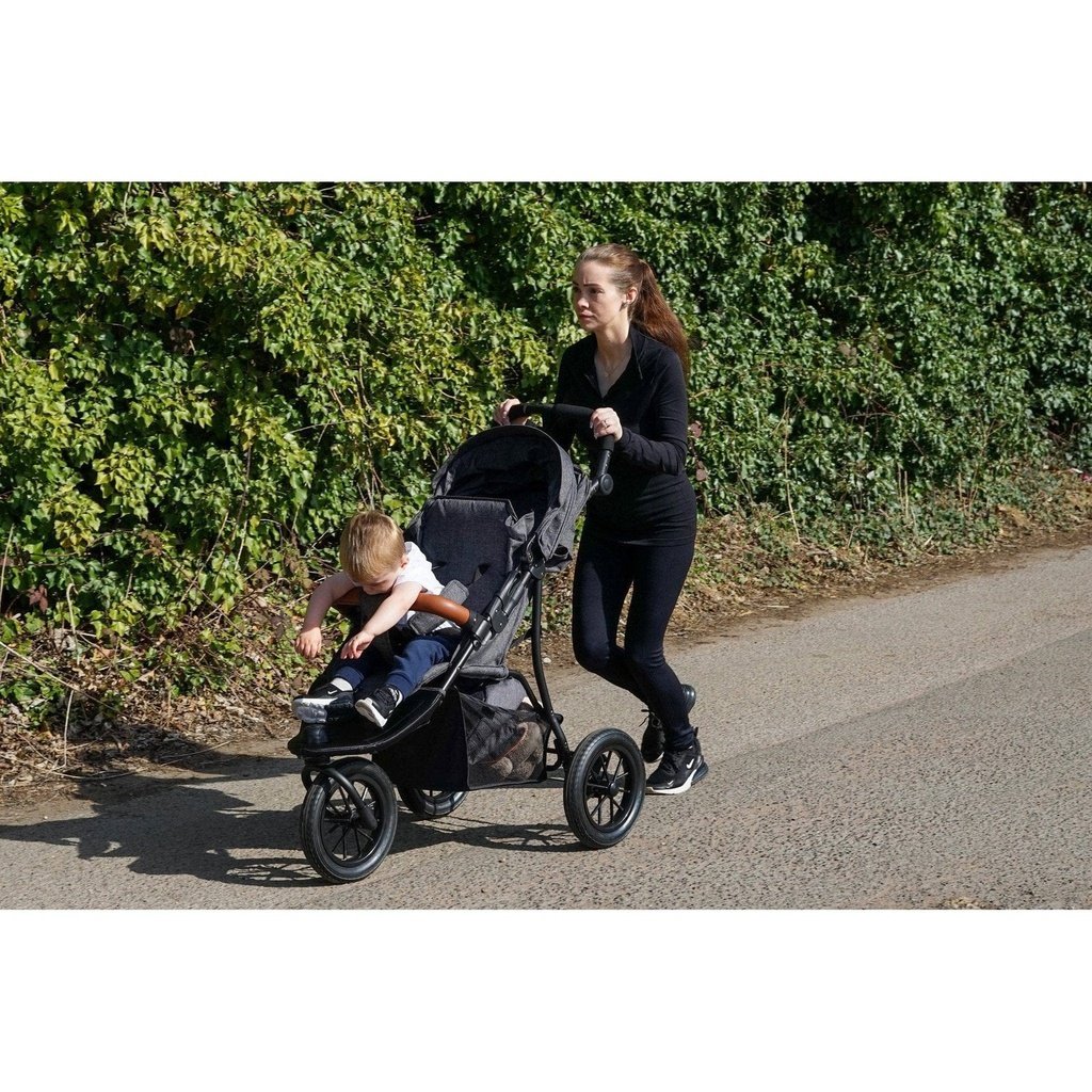Photo of woman jogging with Amababy Swift stroller 
